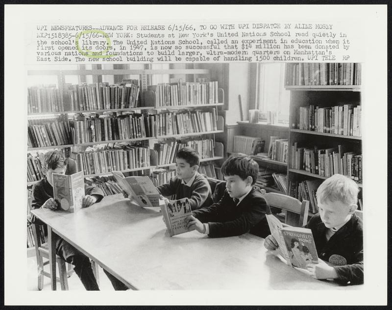 Students at New York's United Nations School read quietly in the school's library. The United Nations School, called an experiment in eduaction when it first opened its door, in 1947, is now so succesful that $14 million has been donated by various nations and foundations to build larger, ultra-modern quarters on Manhattan's East Side. The new school building will be capable of handling 1500 children.