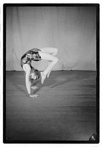 Girl acrobat in costume