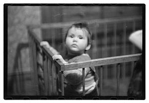 Toddler in crib
