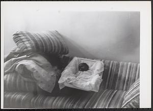 Baby sleeping on a couch