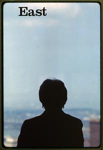 Boston: A woman looks out the window from the John Hancock observatory. 1984