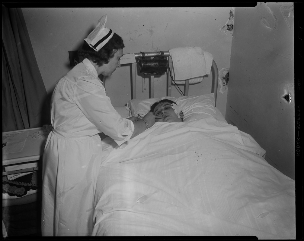 Nurse attending to a patient - Digital Commonwealth