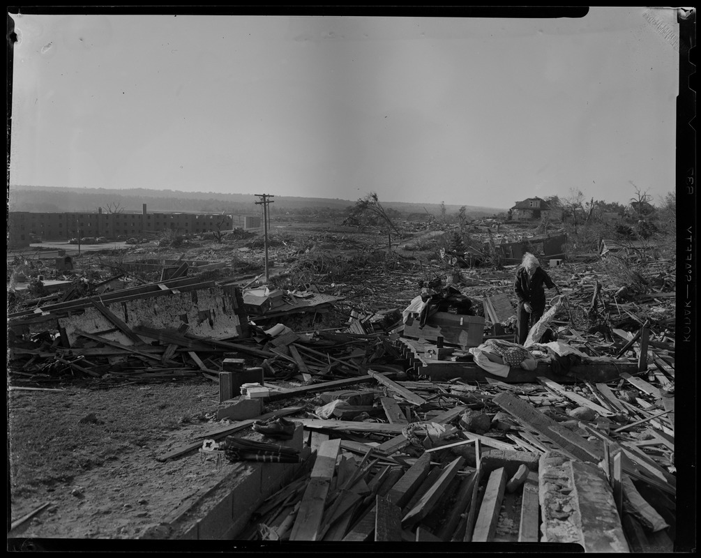 Person Going Through Wreckage Left By Tornado - Digital Commonwealth