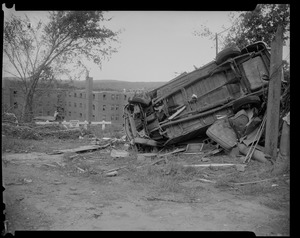 Overturned vehicle and other debris