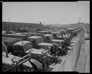 Fleet of trucks parked in a lot