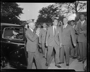 Jawaharlal Nehru exiting vehicle and greeting crowd