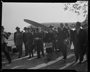 Margaret Clapp, Jawaharlal Nehru, Indira Gandhi, and entourage walking from Air Force airplane