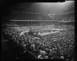 View of stage and crowd during revival service with Billy Graham at Boston Garden