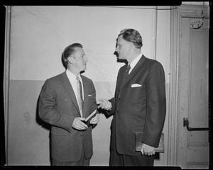 Billy Graham talking with another man