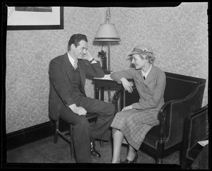 Fred Waring and Ferne seated and looking at each other