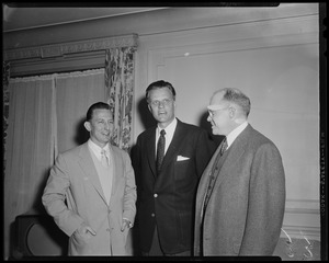 Billy Graham with two other men