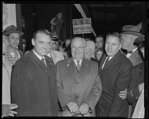Edward McCormack, Harry Truman, and Foster Furcolo surrounded by a crowd, with a "Saltonstall for Congress" sign behind them