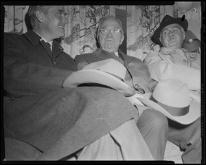 Edward McCormack, Harry Truman, and other man seated on couch