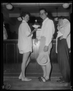 To wed - Stefan Habsburg-Lothringen, 21, son of ex-Princess Ileana of Rumania, now living in Newton, and his bride to be Jerrine Soper, 23, Rosewood st., Mattapan, both clad in white shorts, are show at Hub marriage license bureau where they took out marriage intentions yesterday