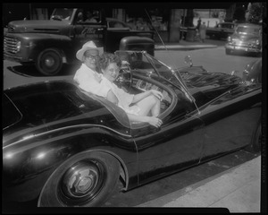 Stefan Habsburg-Lothringen and Jerrine Soper seated in convertible