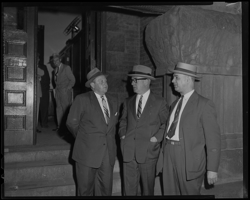 Three men in hats standing outside, most likely related to Elmer "Trigger" Burke case