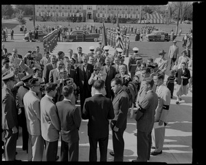 Vice President Richard Nixon, lower right, chats with members of the Lowell Tech Institute's Student Council upon arrival at the school today. In the background are state local dignitaries with school honor guard