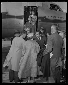 Vice President Richard Nixon deplaning and meeting greeters