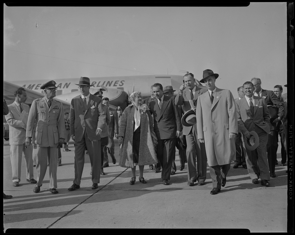 Vice President Richard Nixon and U.S. Representative Edith N. Rogers walking away from American Airlines plane with group