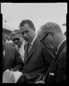 Reporters have a few questions for Vice President Nixon as his plane stops at Logan Airport en route to Maine