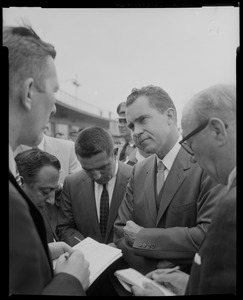 Vice President Richard Nixon talking to reporters