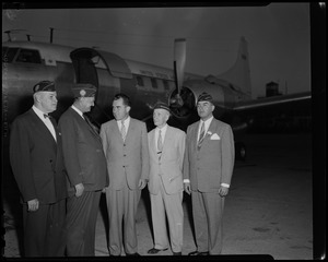 Vice President Nixon is met at East Boston Airport by VFW officials. Next to Nixon in light suit is Police Comm'r Thomas Sullivan