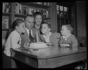 Gowdy to announce Series -- given a surprise party by members of his family, Curt Gowdy, "The Voice of the Red Sox" is shown as he prepares to blow out single candle on cake