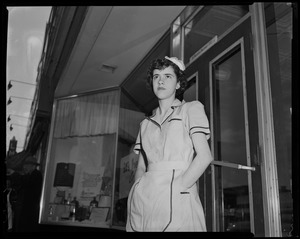 Server Anita Savoie, wearing uniform and standing outside Ropes drugstore