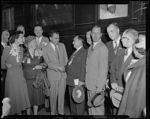 Vice presidential candidate Richard Nixon shaking hands with man, while Pat Nixon, Edith Nourse Rogers, Henry Cabot Lodge, Jr. and others look on