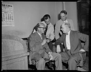 Identify ex-convict -- left to right: Assistant District Attorney Edward M. Sullivan with Patrolman Edward A. Giampaolo and Detective Daniel Crowley who identified picture of Anthony Pino as driver of automobile seen near Trigger Burke's abandoned getaway car and Captain Francis G. Wilson