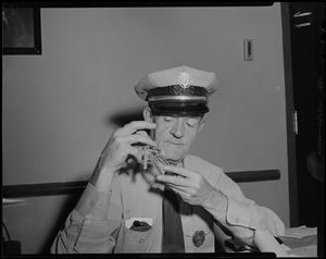 Prison guard holding up ring of keys