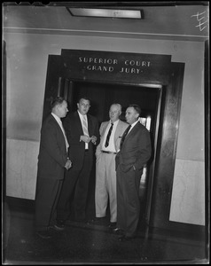 Four men standing outside room marked Superior Court Grand Jury
