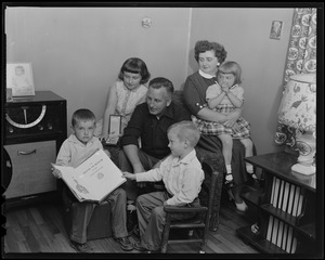 Dahlgren family seated inside, with Edward Dahlgren's Medal of Honor