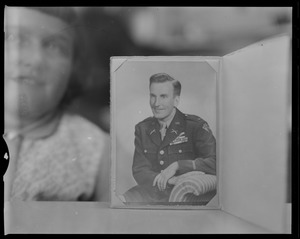 Formal portrait of Congressional Medal of Honor winner Lt. Edward Dahlgren in military uniform, with daughter behind it