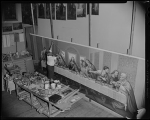 Gaston Goyette of Bedford, world-famous ecclesiastical artist, puts finishing touches to his interpretation of The Last Supper