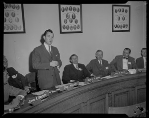 Francis X. Ahearn, acting Mayor of Boston, speaking at Governor's Conference, with John A. Briggs, Carl Nelson, John A. Volpe, Robert W. Bodfish, Donald H. Blatt, and William Stapelton