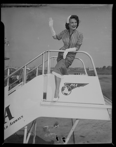 Joan Daly, Somerville, Miss Massachusetts, '53, leaves airport for Long Beach, Cal., to compete in the Miss Universe contest tomorrow