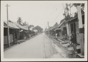 Street in Trinidad, B. W. I., note open sewer by side of road