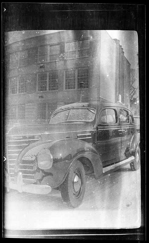 Car in front of building