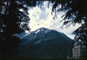 View of mountaintop beyond building in foreground, British Columbia