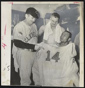 "That's the One We're Shooting For, "says Cleveland Manager Al Lopez as he points to No. 14 on Larry Doby's uniform. The Indians tied the team record at 13 straight wins by beating the St. Louis Brown, 9-4 last night. Third baseman AL Rosen (center) helped by hitting his fourth grandslam homer of the season and Doby (right). hit a single double and triple.