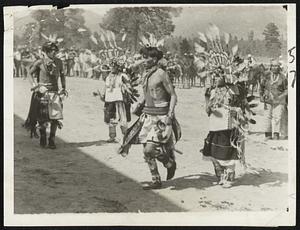 [Ind]ian girls make whoopee with rare butterfly dance old days, while Hopi and Navajaho squaws engage o-war in redskin festival at Flagstaff, Arizona.