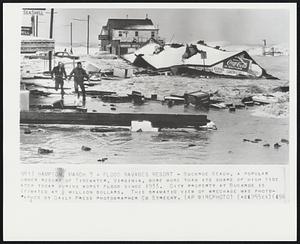 Flood Ravages Resort - Buckroe Beach, a popular summer resort of Tidewater, Virginia, bore more than its share of high tide later today during worst flood since 1933. City property at Buckroe is estimated at ¼ million dollars. This dramatic view of wreckage was photographed by Daily Press photographer Ed Streeky.