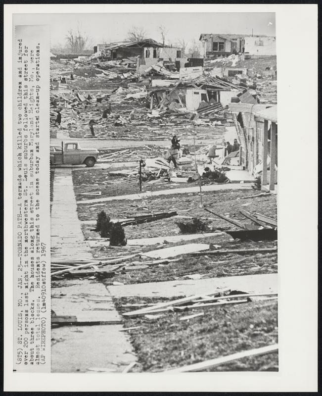 St. Louis, Mo. – Tornado Path – A tornado which killed two children and injured over 200 persons last night in the northwestern St. Louis suburbs followed this street for about three blocks. The houses along this street in suburban Maryland Heights, Mo., were almost total losses. Residents returned to the scene today and started clean-up operations.