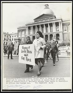 Peace groups march in front of the State House 4/2 to coincide with the arrivals of Louise Bruyn of Newton, Mass., in Washington, D.C. Mrs. Bruyn marched from Newton to Washington to protest the Vietnam war.