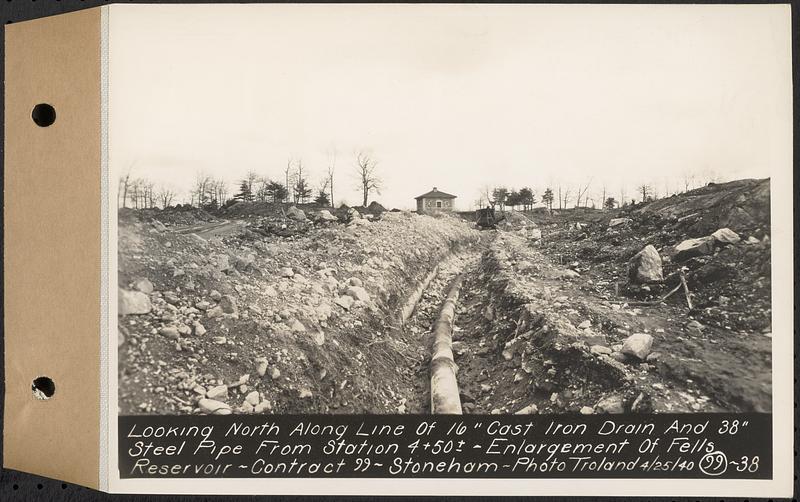 Contract No. 99, Enlargement of Fells High Level Distribution Reservoir, Stoneham, Malden, Melrose, looking north along line of 16 inch cast iron drain and 38 inch steel pipe from Sta. 4+50+/-, enlargement of Fells Reservoir, Stoneham, Mass., Apr. 25, 1940