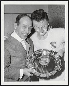 Racquet Busters are Henri Salaun (right) of Boston, who won the first U. S. Open Squash Racquets championship in New York by upsetting Hamish Khan of Pakistan, and the man who taught him the game, Jimmy Reid of New York.