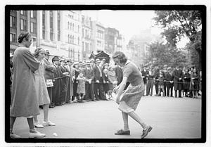 Two young women competing, Boston Common