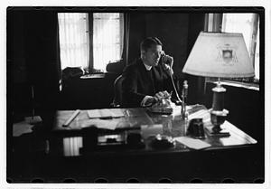 A priest on a phone call