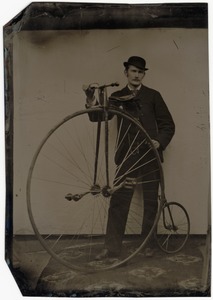 Cyclist with High Wheeled Bicycle